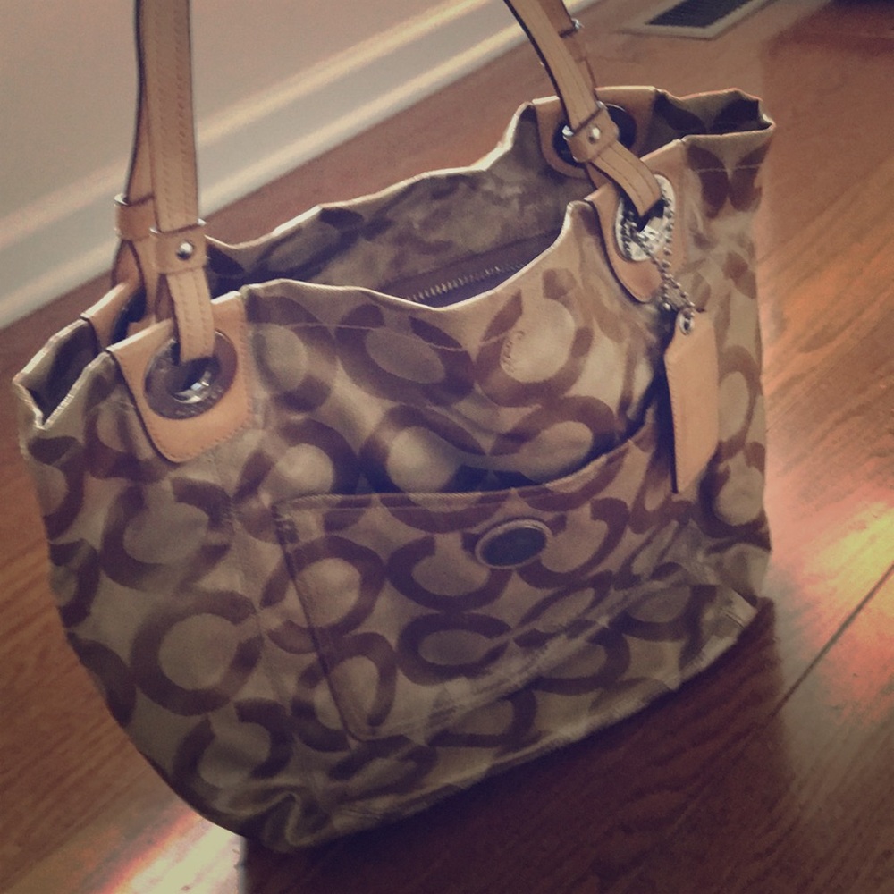 Tan Coach bag. Signature Print.